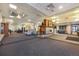 Spacious lobby featuring a stone fireplace, comfortable seating areas, and stylish decor at 650 S Clinton St # 6D, Denver, CO 80247