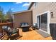 Inviting deck with patio furniture, perfect for outdoor relaxation and entertaining at 21950 E Crestline Ln, Aurora, CO 80015
