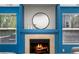 A close up of the fireplace, which features a mantel and a tile surround at 21950 E Crestline Ln, Aurora, CO 80015