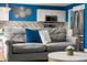 Open-concept living space that connects to the kitchen, dining, and staircase at 21950 E Crestline Ln, Aurora, CO 80015