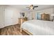 Spacious Primary bedroom featuring a dresser and ensuite bathroom at 21950 E Crestline Ln, Aurora, CO 80015