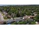 Aerial view showcases a charming neighborhood with mature trees and well-kept yards at 6931 W 75Th Pl, Arvada, CO 80003