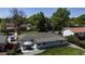 Aerial view of home with backyard patio at 6931 W 75Th Pl, Arvada, CO 80003