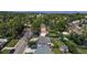 A neighborhood view with mature trees, manicured lawns, and diverse home styles creating a welcoming and picturesque community at 6931 W 75Th Pl, Arvada, CO 80003