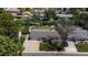 Aerial view of home showing the driveway and front yard at 6931 W 75Th Pl, Arvada, CO 80003