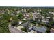 Wide aerial view of a suburban neighborhood, with mature trees and well-maintained lawns at 6931 W 75Th Pl, Arvada, CO 80003