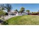 Wide view of a backyard with a patio and privacy fencing at 6931 W 75Th Pl, Arvada, CO 80003