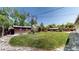 The backyard is landscaped with a shed at 6931 W 75Th Pl, Arvada, CO 80003