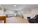 Bedroom with a crib, a chair, and a world map on the wall at 6931 W 75Th Pl, Arvada, CO 80003