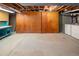 Unfinished basement with wooden cabinets and laundry machines at 2610 Heidelberg Dr, Boulder, CO 80305