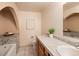 Elegant bathroom with neutral color scheme, updated fixtures, and tiled countertops at 2610 Heidelberg Dr, Boulder, CO 80305