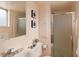 Cozy full bathroom with peach colored walls, shower, sink, and decor at 2610 Heidelberg Dr, Boulder, CO 80305