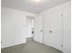 Bedroom featuring a window and two doors at 2610 Heidelberg Dr, Boulder, CO 80305
