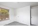 Bright bedroom with gray carpet and a large window at 2610 Heidelberg Dr, Boulder, CO 80305