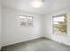 Bedroom with gray carpet and views of both neighborhood street and the Flatirons at 2610 Heidelberg Dr, Boulder, CO 80305