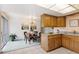 Open kitchen-dining room concept with views to the backyard and sliding glass door at 2610 Heidelberg Dr, Boulder, CO 80305
