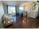 Spacious living room featuring hardwood floors and a view at 1358 Buttercup Rd, Elizabeth, CO 80107