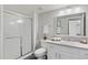 Contemporary bathroom featuring a shower, framed mirror, modern vanity and new countertop at 14652 E 2Nd Ave # 200D, Aurora, CO 80011