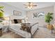Inviting bedroom with a comfortable bed, plush pillows, and a cozy blanket at 14652 E 2Nd Ave # 200D, Aurora, CO 80011