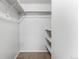 Empty closet with shelving and metal rod at 14652 E 2Nd Ave # 200D, Aurora, CO 80011