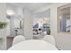 Partial view from the dining room into the kitchen and living room at 14652 E 2Nd Ave # 200D, Aurora, CO 80011