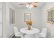 Bright dining room with stylish decor and a white table at 14652 E 2Nd Ave # 200D, Aurora, CO 80011