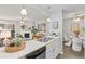 Partial view of the kitchen which overlooks the living room and dining area at 14652 E 2Nd Ave # 200D, Aurora, CO 80011