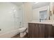Bathroom boasts a glass-enclosed shower and elegant vanity with modern finishes at 4537 N Tennyson St # 101, Denver, CO 80212