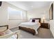 Bedroom featuring carpet, natural light, and neutral wall paint at 4537 N Tennyson St # 101, Denver, CO 80212