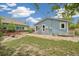 Spacious backyard with a mix of stone patio, lawn and garden beds, great for outdoor relaxation and entertaining at 280 Pierce St, Erie, CO 80516