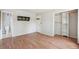 Spacious bedroom features wood floors, closet, wall mounted hooks and a full bathroom nearby at 280 Pierce St, Erie, CO 80516