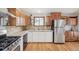 Bright kitchen with stainless steel appliances and plenty of cabinet space at 280 Pierce St, Erie, CO 80516