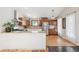 Beautiful kitchen with wood cabinetry, stainless steel appliances, and great natural light at 280 Pierce St, Erie, CO 80516