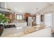 Bright kitchen features stainless steel appliances, granite countertops, and a breakfast bar at 280 Pierce St, Erie, CO 80516