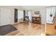 Inviting living room boasts hardwood floors, an accent chair, and an open layout at 280 Pierce St, Erie, CO 80516