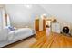 Charming bedroom with hardwood floors, white walls and an en-suite bathroom at 420 Chinook Rd, Idaho Springs, CO 80452