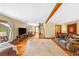 Bright living room with hardwood floors and a cozy seating area at 420 Chinook Rd, Idaho Springs, CO 80452