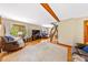 Bright living room with hardwood floors and mountain views at 420 Chinook Rd, Idaho Springs, CO 80452