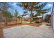 Backyard patio with pergola near garden plots, offering a blend of relaxation and gardening opportunities at 2958 E Euclid Pl, Centennial, CO 80121