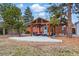 Backyard featuring a patio with stylish seating under a wooden pergola, creating an inviting outdoor retreat at 2958 E Euclid Pl, Centennial, CO 80121
