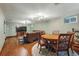 Basement recreation area with hardwood floors, recessed lighting, and entertainment and dining spaces at 2958 E Euclid Pl, Centennial, CO 80121