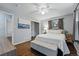 Spacious bedroom with hardwood floors, a large closet, ceiling fan and soothing gray walls at 2958 E Euclid Pl, Centennial, CO 80121