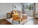 Spacious living room featuring hardwood floors, neutral color scheme and large windows at 2958 E Euclid Pl, Centennial, CO 80121