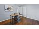 Bright home office features hardwood floors, a modern desk, and ample natural light for a productive workspace at 2958 E Euclid Pl, Centennial, CO 80121