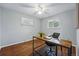 Inviting office space with natural light, hard wood floors, and neutral paint provides a cozy and inspiring work environment at 2958 E Euclid Pl, Centennial, CO 80121