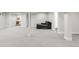 Finished basement space with ample room for seating or recreation at 9861 E Ohio Ave, Denver, CO 80247