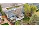 Aerial view of the home showcasing the backyard, patio, and well-maintained landscaping at 7282 S Vance St, Littleton, CO 80128