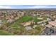 An aerial view of a community park, with a playground, ball field, and walking paths at 7282 S Vance St, Littleton, CO 80128