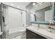 Modern bathroom features white subway tile, updated fixtures, and a vanity with a sleek design at 3365 Chisholm Trl # B102, Boulder, CO 80301