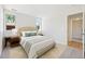 Stylishly staged bedroom with carpet, complemented by decor and bright natural light at 3365 Chisholm Trl # B102, Boulder, CO 80301
